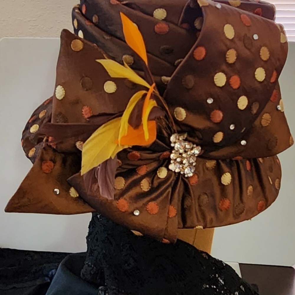 Elegant Polka Dot Hat with Feather Accent